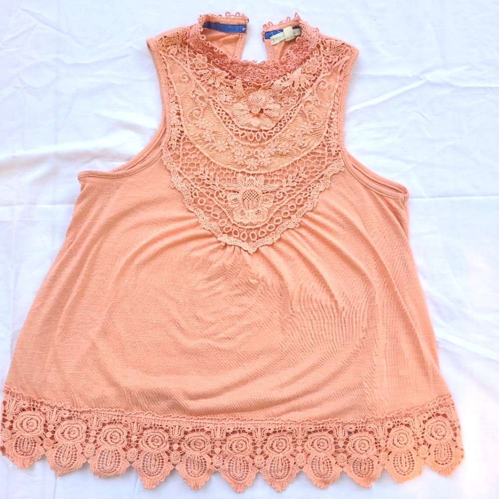 Peach sleeveless blouse